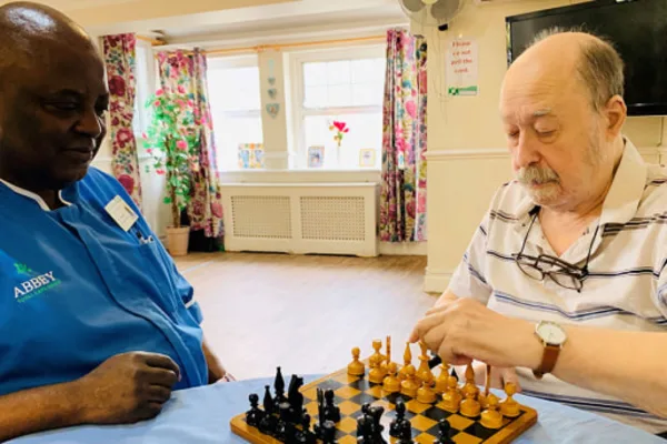 Residents enjoying chess at Forest Place